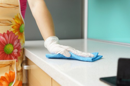 Carpet cleaning team following a safe work routine